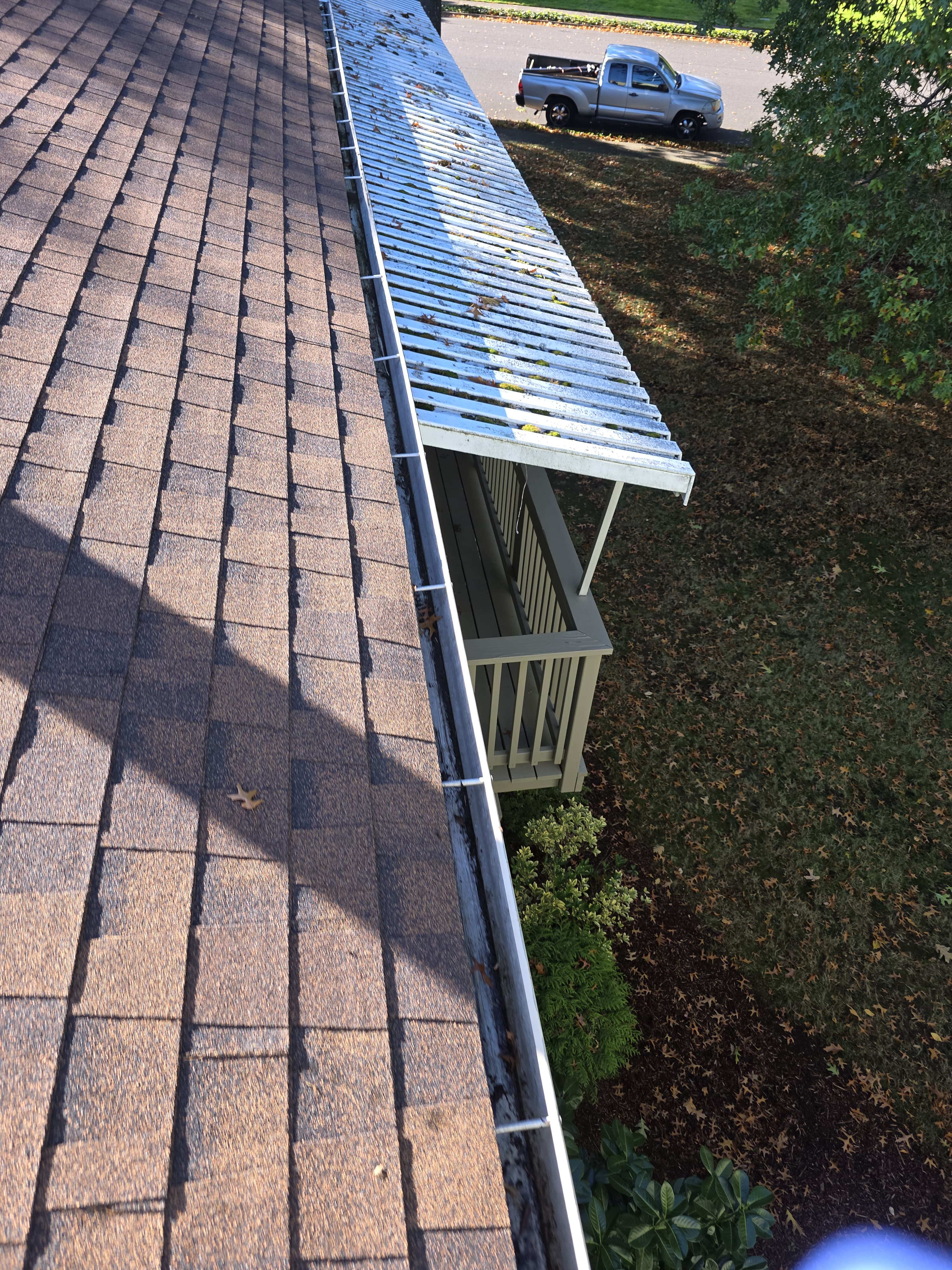 After: Clean gutters and roof